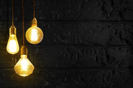 Vintage or retro lamp on old wall in home, Lighting equipment in interior home with dark light...