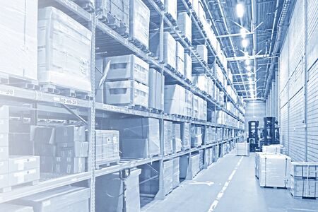Rows of shelves goods boxes in warehouse store storage.                               