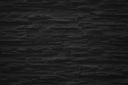 Dark grey black slate texture with high resolution, pattern of stone brick wall for background and design art work                               の写真素材