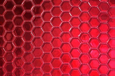 Red hexagonal tiles as an extra wide background                               の写真素材