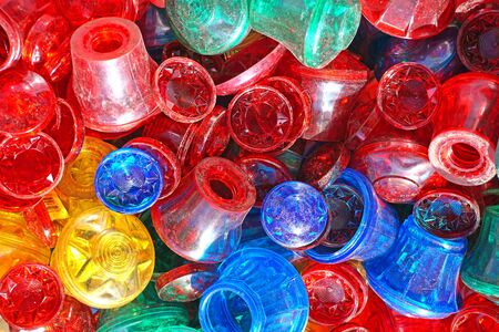 colored lampshades for light bulbs are in the boxの写真素材