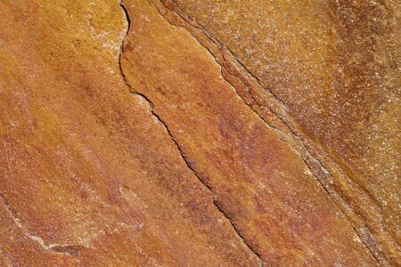 Red sandstone texture. Natural colorful stone background.