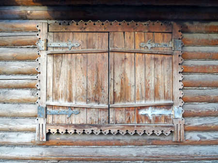 Old wooden border of the window with wooden wallの写真素材