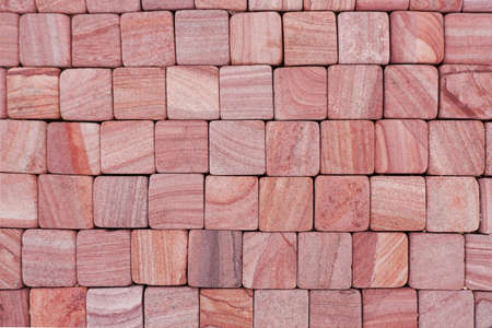 The texture of the paved tile on the bottom of the street. Natural brick squared stone floorの写真素材
