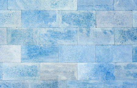 a wall of blue stone blocks