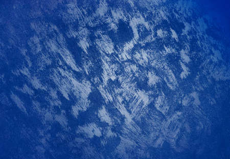 Abstract background blue, smears of gray paint on the wall