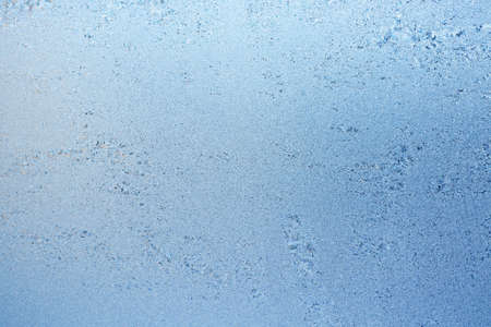 Frost ice texture on winter window glass