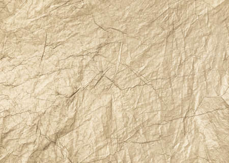 Gray crumpled sheet of rough paper closeup texture and blank background.の写真素材