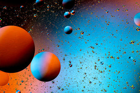 Abstract colorful background of oil circles. Oil in the water surface circles, water foam and oil bubbles. High quality photoの写真素材