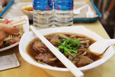 Singaporean beef noodles at a food court