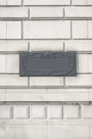 a doorplate on the wall in vintage style.の写真素材