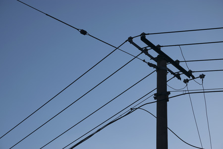 Sketch of an electricity pole with blue sky background. 