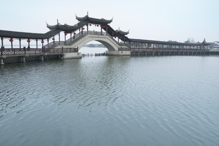 JINXI, SHANGHAI, CHINA - FEB 21: the antique Wenchang Pavilion to the old village at dusk.
