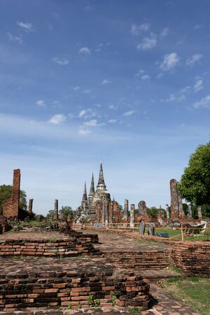 The interesting ruined statue and pagodas around Wat Phra Si Sanphet.の写真素材