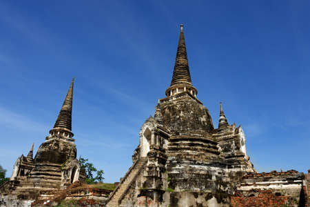 Photo of the main and sub temple of Wat Phra Si Sanphet with gorgeous sky.の写真素材