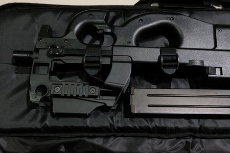 Close up a black BB Gun with a magazine in the case.の写真素材