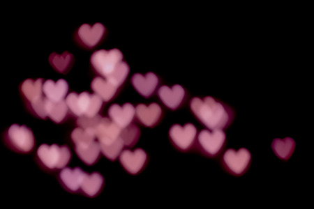 Beautiful bokeh in heart shape. Filter added.の写真素材