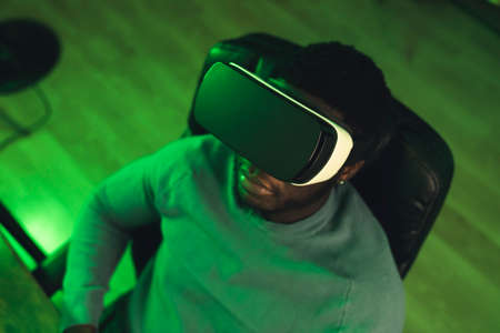 black man VR game neon lights - portrait shot. High-quality photoの写真素材