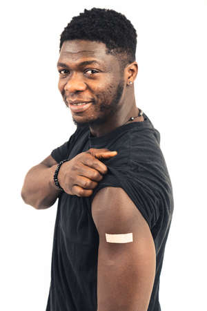 African American man satisfied vaccinated white background - portrait shot. High-quality photo
