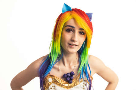 Rainbow Dash Caucasian Woman Cosplayer gently smiling and softly looking into the camera medium close-up shot. High quality photoの写真素材