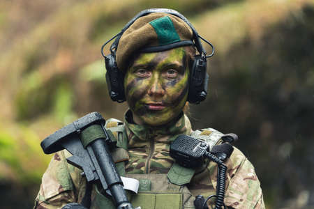 Cold hearted tough woman soldier serving her motherland . High quality photoの写真素材