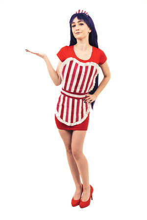 Caucasian Sailor Mars Woman Cosplayer Waiting With Her hand showing copy space White Background Full Studio Shot. High quality photoの写真素材