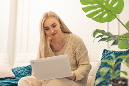 strong and proud European entrepreneur woman doing research for her growing business. High quality photoの写真素材