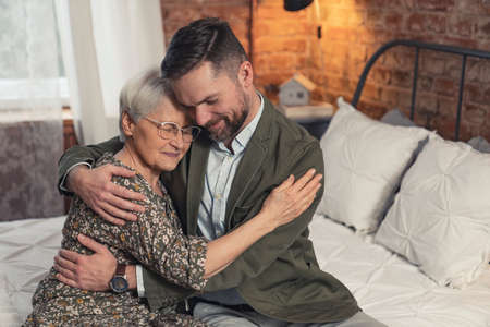 happy caucasian mother and son hugging and celebrating Mothers Day. High quality photoの写真素材