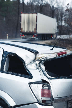 Smashed rear windshield of a mini hatchback car . High quality photoの写真素材