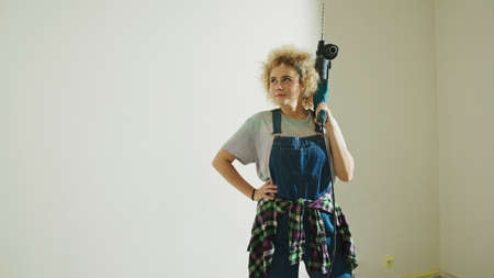 Attractive Caucasian Girl thinking about new DIY Project - copy space. High quality photoの写真素材