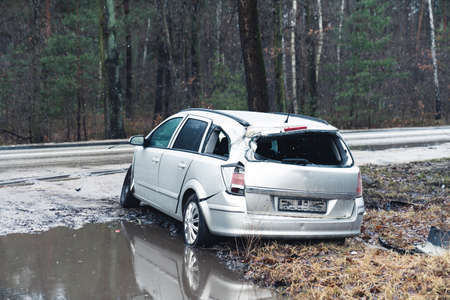 Disastrous family suv at countryside Poland woods . High quality photoの写真素材