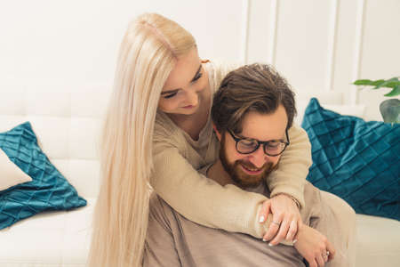 Young Caucasian couple hugging and smiling portrait. High quality photoの写真素材