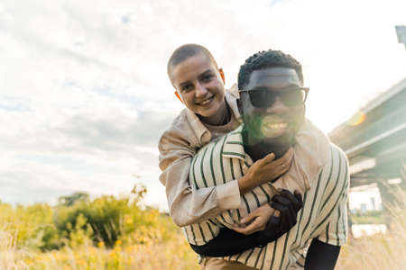 multiracial friends enjoying together on a summer trip, medium shot outdoors. High quality photoの写真素材