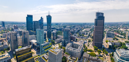 7.22.2022 Warsaw, Poland. Wide panoramic shot. Fast pace of development in Warsaw, Various skyscrapers in the centre. Aerial shot. High quality photoのeditorial素材