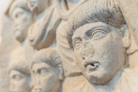 07.13.2022 Thessaloniki, Greece. Stunning closeup shot of white marble or stone sculpture. Greek-style ancient face sculpture. Well-preserved archeological findings. High quality photoのeditorial素材