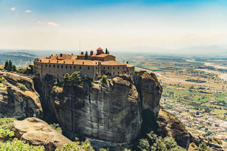 Picturesque drone view of one of many orthodox monasteries in Meteora, Greece. Stunning religious architecture and natural environment. High quality photoの写真素材