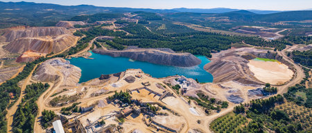 Beautiful full panoramic aerial view of an open-pit mine in Greece. Forests and mountains on the horizon. High quality photoの写真素材