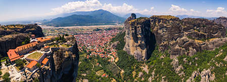 Panorama. Aerial drone view of Meteora Greece near the town of Kalambaka. Famous monasteries. Meteora, Greece near town Kalambaka. High quality photoの写真素材