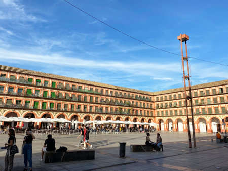 09.10.2021. Cordoba, Spain. Corredera Square, Plaza de la Corredera. many restaurants and cafes in the background. High quality photoのeditorial素材