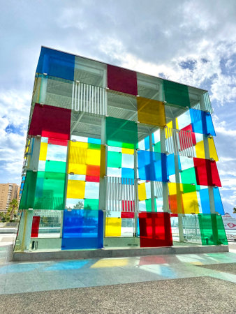 30.10.2021. Malaga, Spain.Centre Pompidou in Malaga, Andalucia, Spain. a colorful cube from glass and steel, also called El Cubo. High quality photoのeditorial素材