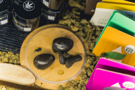 05.28.2022 Warsaw, Poland CBD Hashish on a wooden tray. High quality photoのeditorial素材