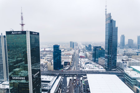 11.21.2022 Warsaw, Poland. Varso Tower and Centrum LIM. Polish skyscrapers in downtown Warsaw. Winter season. Cloudy sky. High quality photoのeditorial素材