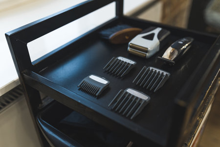 Electric shaving trimmer kit. Shaving equipment. Barber tools. Black barber trolley. High quality...