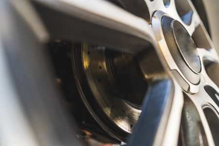 Close-up shot of a car wheel. Repair shop concept. High quality photoの写真素材