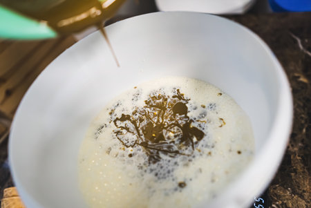 Pistachio ice cream ingredients mixing in a bowl. High quality photoの写真素材