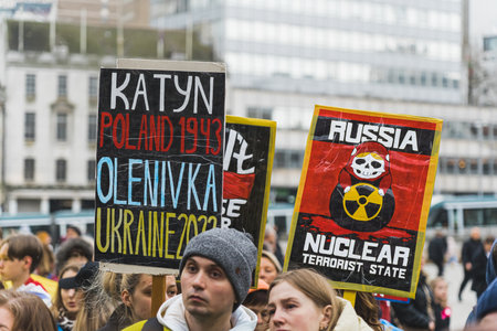 02.28.2023 - Nottingham, United Kingdom - people with banners against Russia at the protest. High quality photoのeditorial素材
