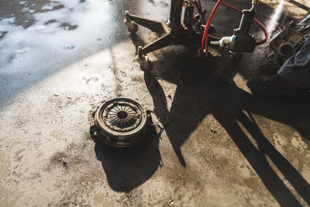 gearbox lying on the floor during clutch replacement, repair shop concept. High quality photoの写真素材