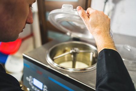 Ice cream pasteurization machine rotating with closed lid to pasteurize icecream. High quality photoの写真素材