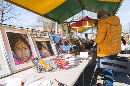 04.18.2023 Hillegom, Netherlands. Stunning portraits of children drawn by a Dutch artist. Small workshop market organised in the town of Hillegom.のeditorial素材