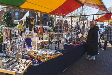 04.18.2023 Hillegom, Netherlands. Local Dutch artists selling their artistic jewellery pieces at an outdoor market in Hillegom. High quality photoのeditorial素材